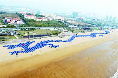 金沙灘900頂帳篷拼出世界第一龍 金沙灘900頂帳篷拼出世界第一龍