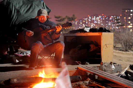小麥島流浪王 中國(guó)阿甘騎三輪走中國(guó)