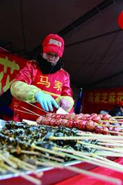 今天鬧元宵 糖球開會(huì)游人開胃