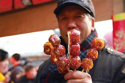 今天鬧元宵 糖球開會(huì)游人開胃